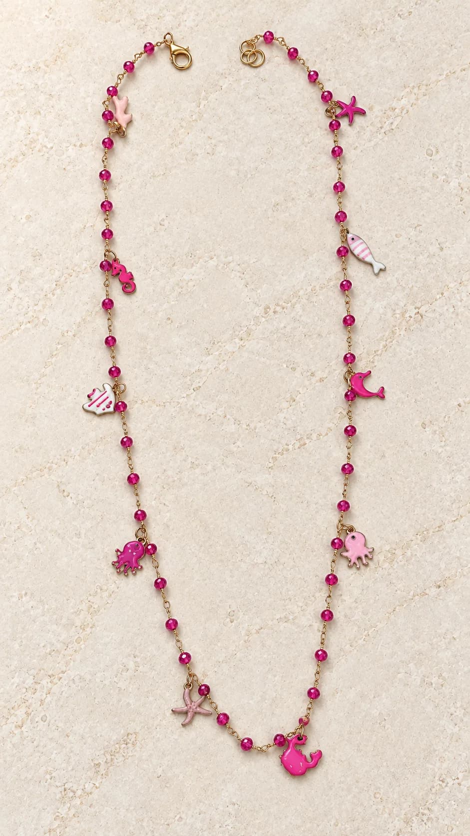 Collana Mare rosa con perline fucsia e ciondoli del mare